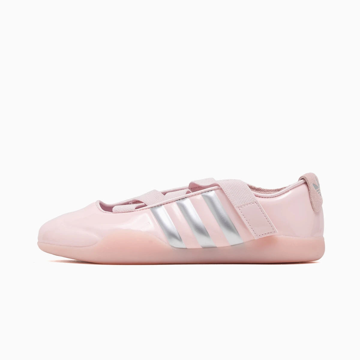 Pink Adidas taekwondo shoe with silver stripes on a white background