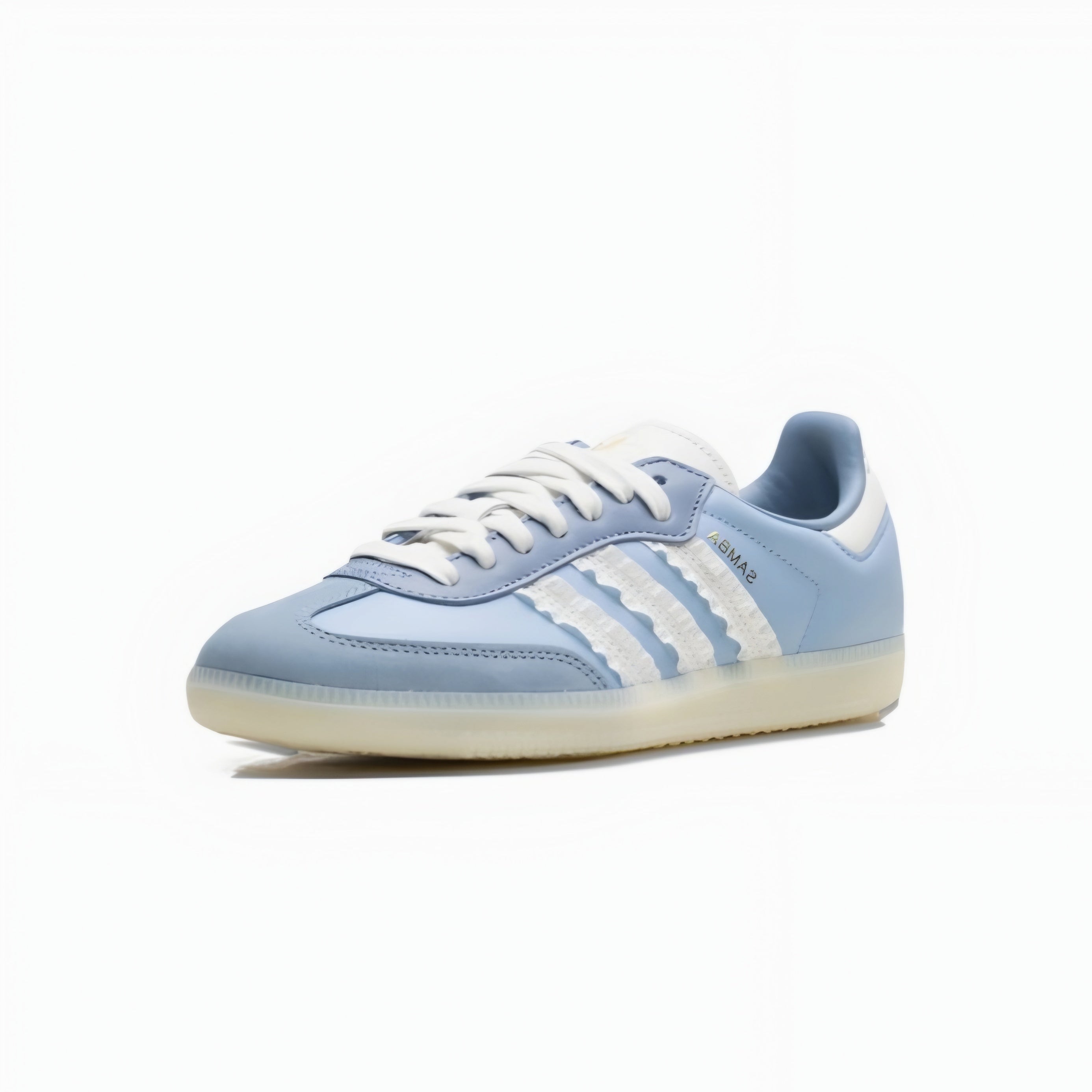 A light blue Adidas Samba sneaker with white three-stripes, white laces, and a translucent off-white sole, shown from a side profile on a white background.