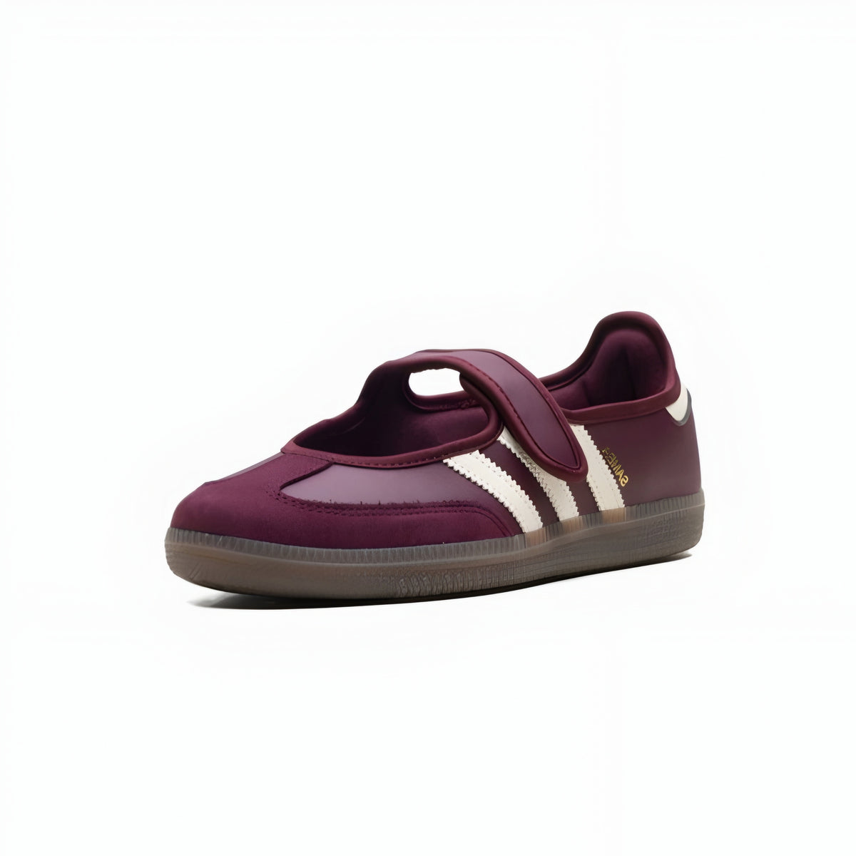 A single vintage-style low-top sneaker in deep burgundy with white side stripes and a brown gum sole, photographed from a three-quarters angle on a white background.