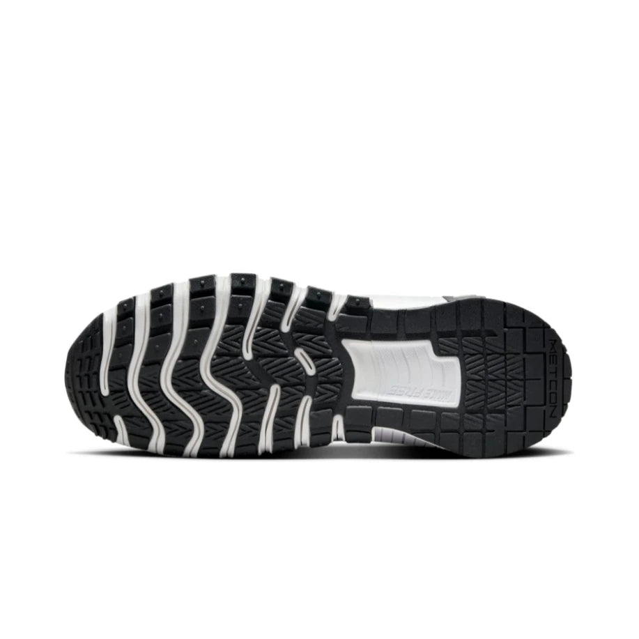 Black and white sneaker sole on a light gray background