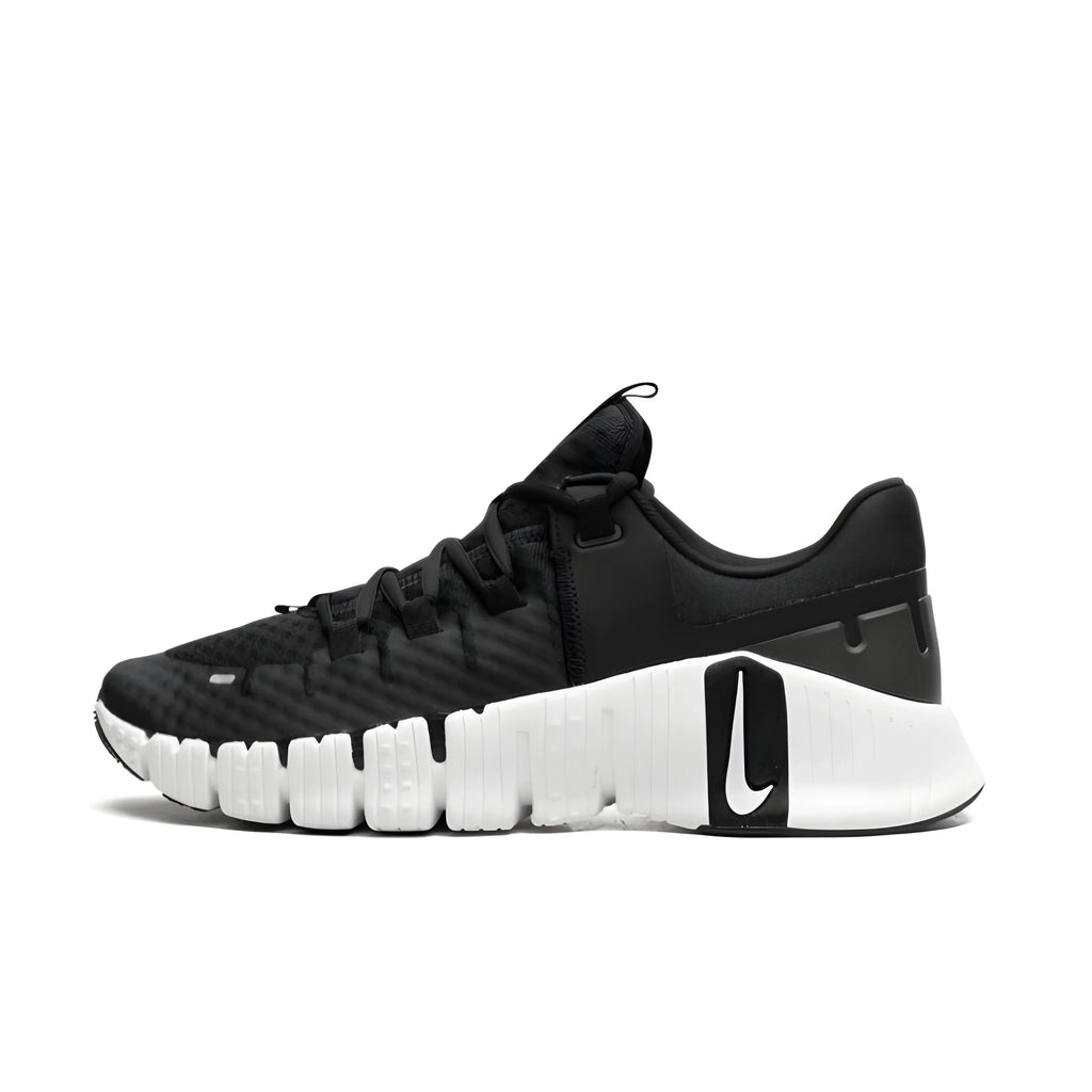 Black running shoe with white sole on a light gray background