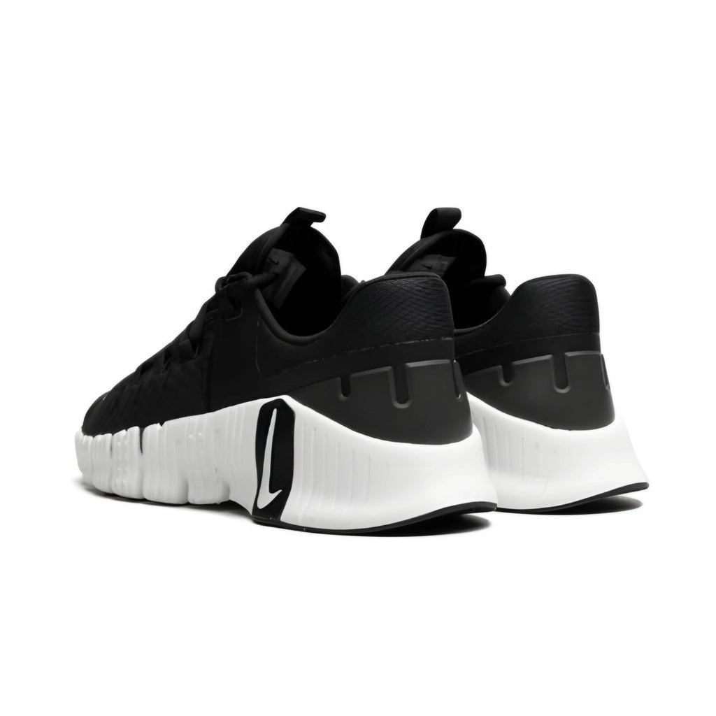 Black and white sneakers on a white background