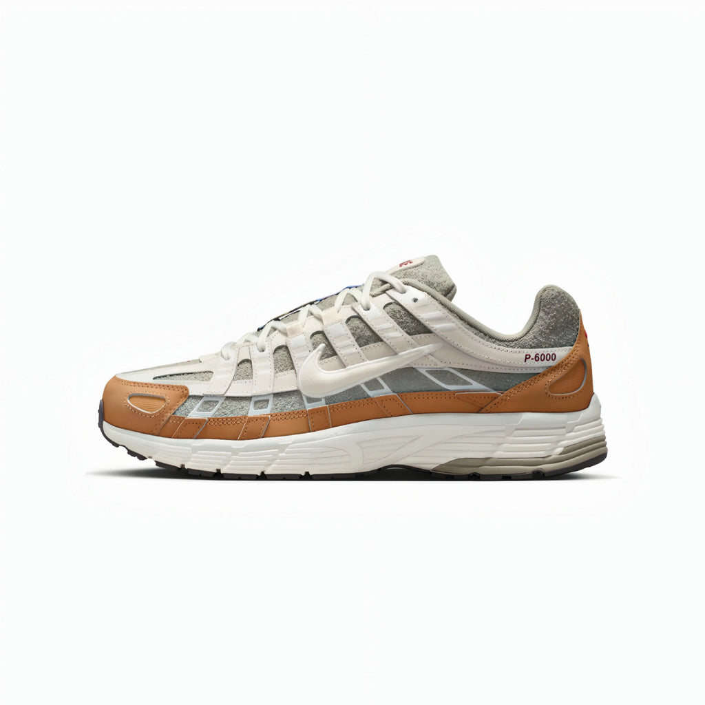 A Nike P-6000 sneaker in a cream, gray, and tan colorway, shown from a side profile on a clean white background.