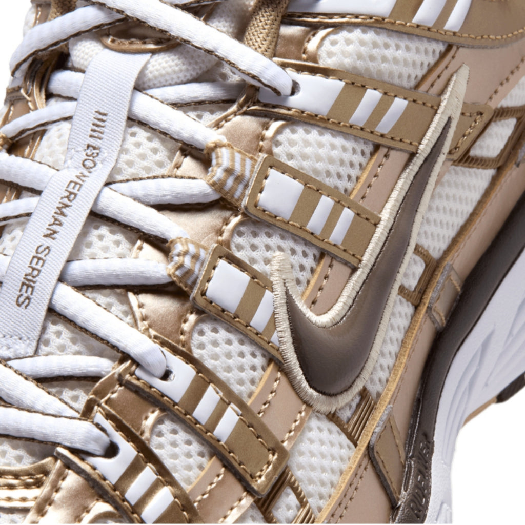 Nike P-6000 Metallic Gold metallic close up view