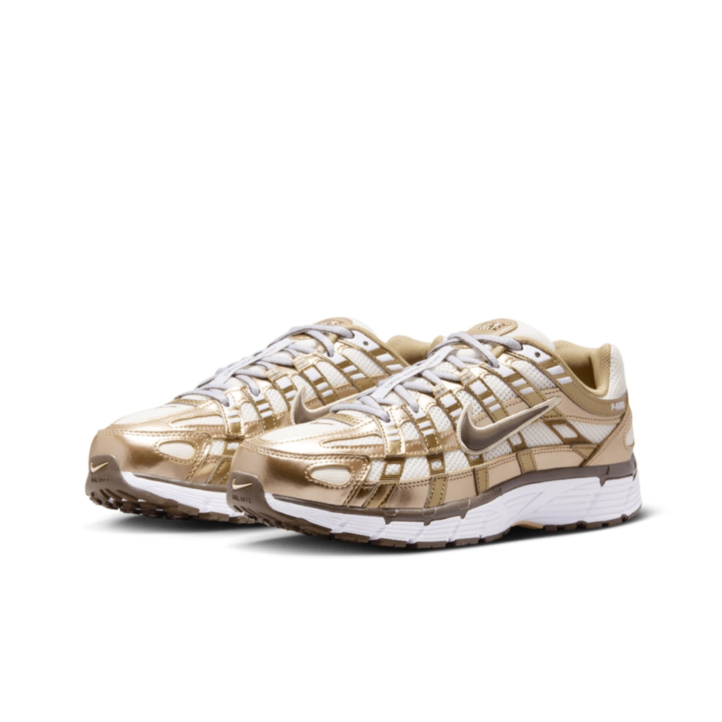 Nike P-6000 Metallic Gold women's sneakers angled view