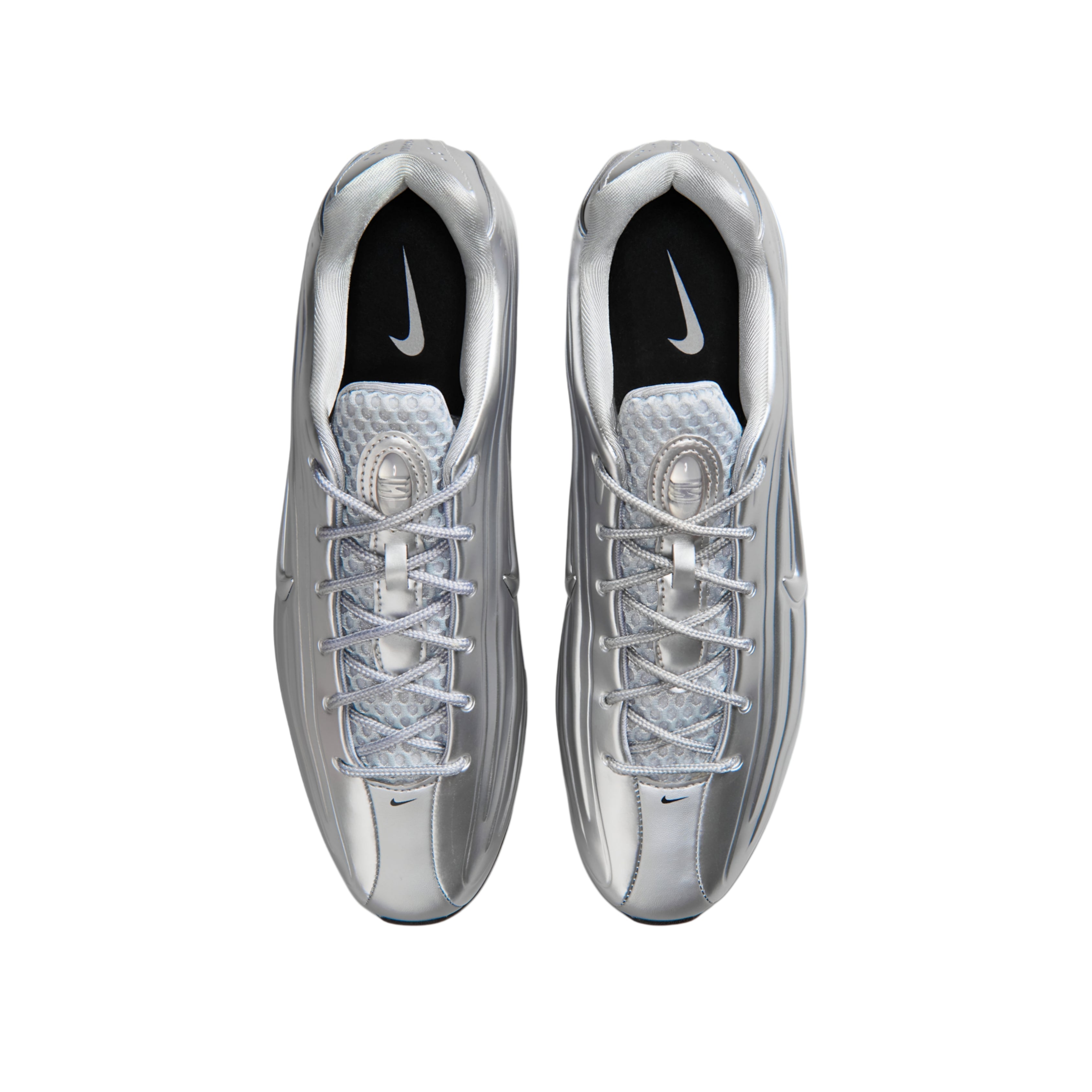 A pair of metallic silver Nike running shoes shown from a top-down view on a plain white background.