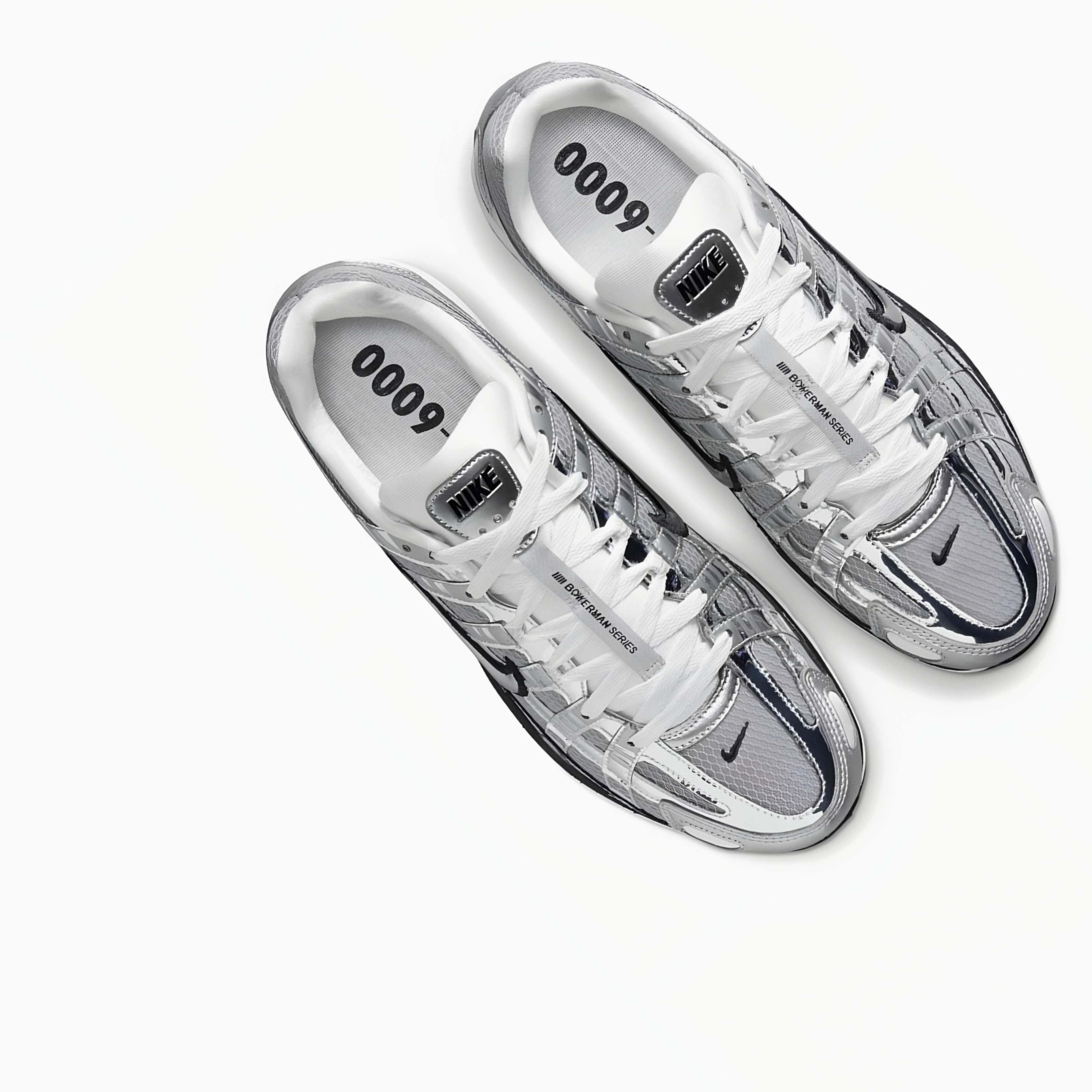 Nike P6000 Silver sneakers with '6000' branding on a white background